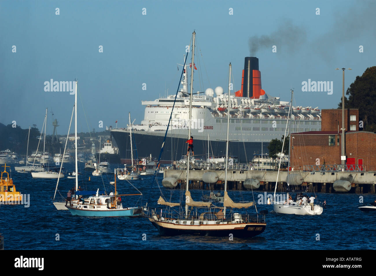 Ocean cruise liner Queen Elizabeth 2 in Sydney Harbour, Sydney, New South Wales, Australia Stock Ocean cruise liner Queen Elizabeth 2 in Sydney Harbour, Sydney, New South Wales, Australia Stock