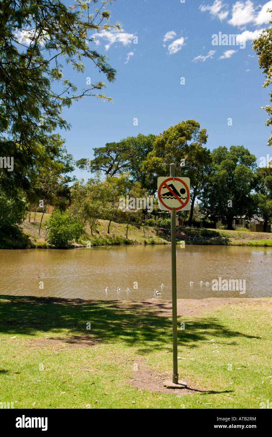 No Swimming sign at Coburg lake in Melbourne. Stock Photo