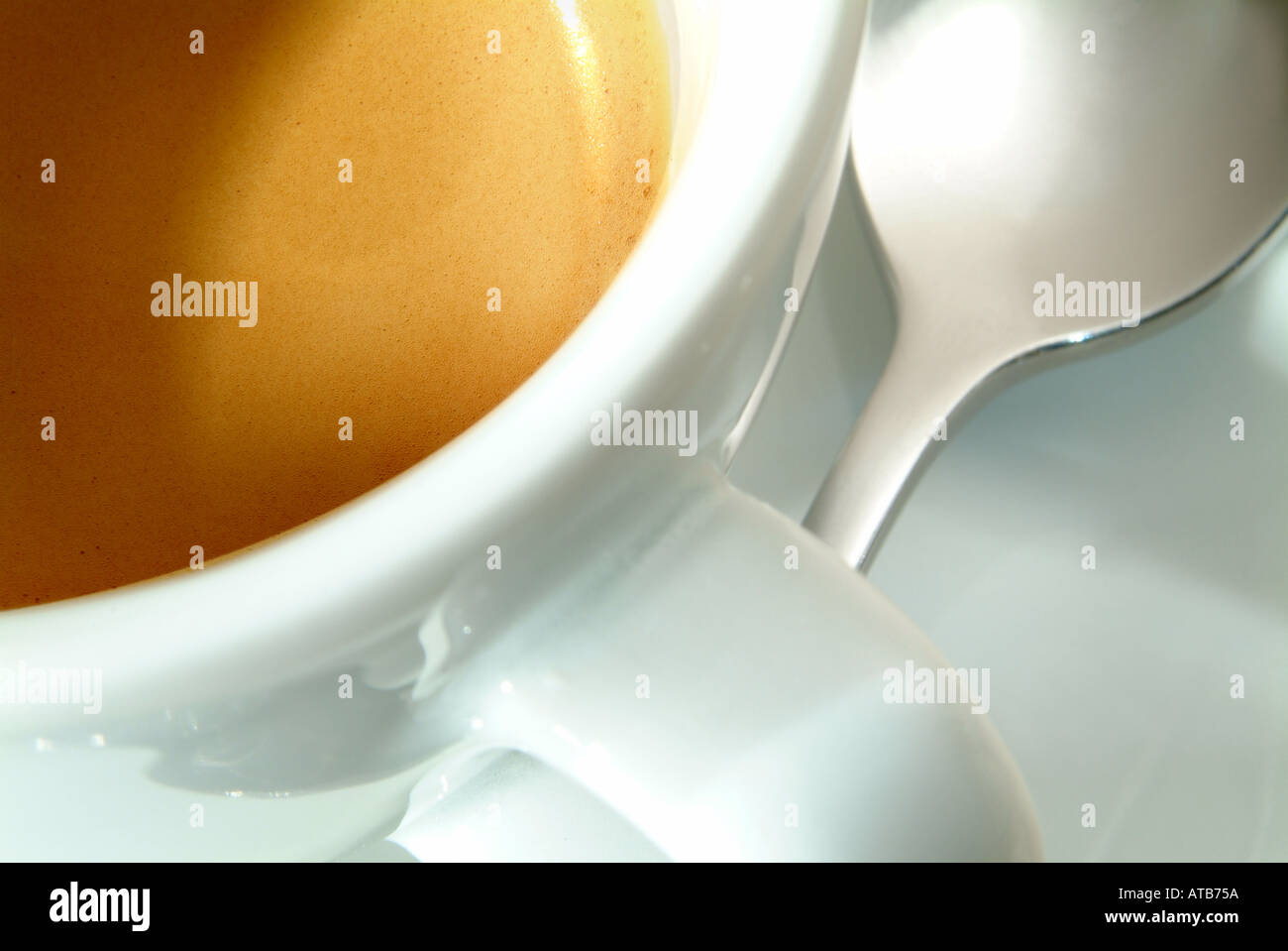 gefuellte Espresso Tasse mit Loeffel Stock Photo