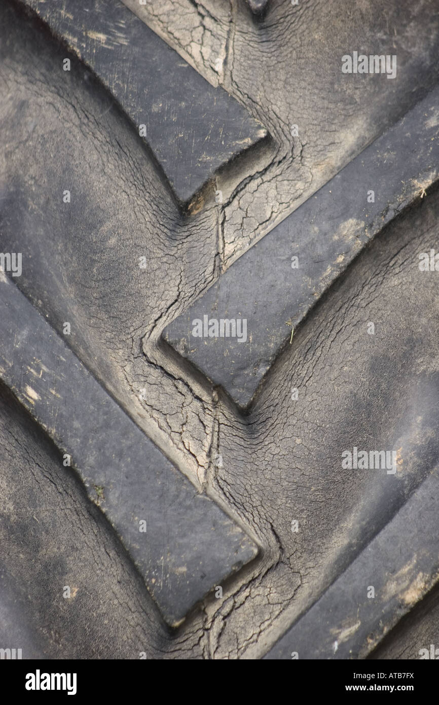 Tractor tyre tire tread close up pattern rubber moulding grip solid big deep worn cracking