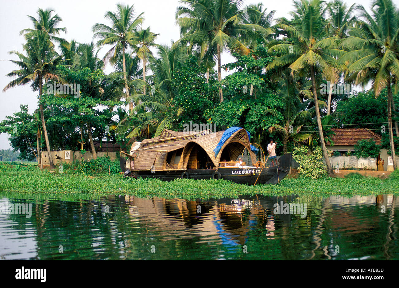 India Kerala A houseboat which is transformed into a luxury hotel for tourist cruising along the backwaters Near Cochin Stock Photo