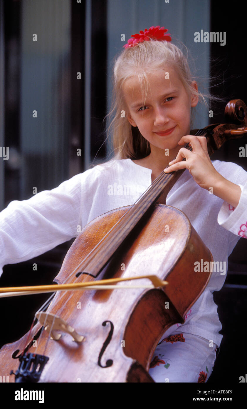 Young girl playing Cello at Riga Old Town riga Latvia Stock Photo