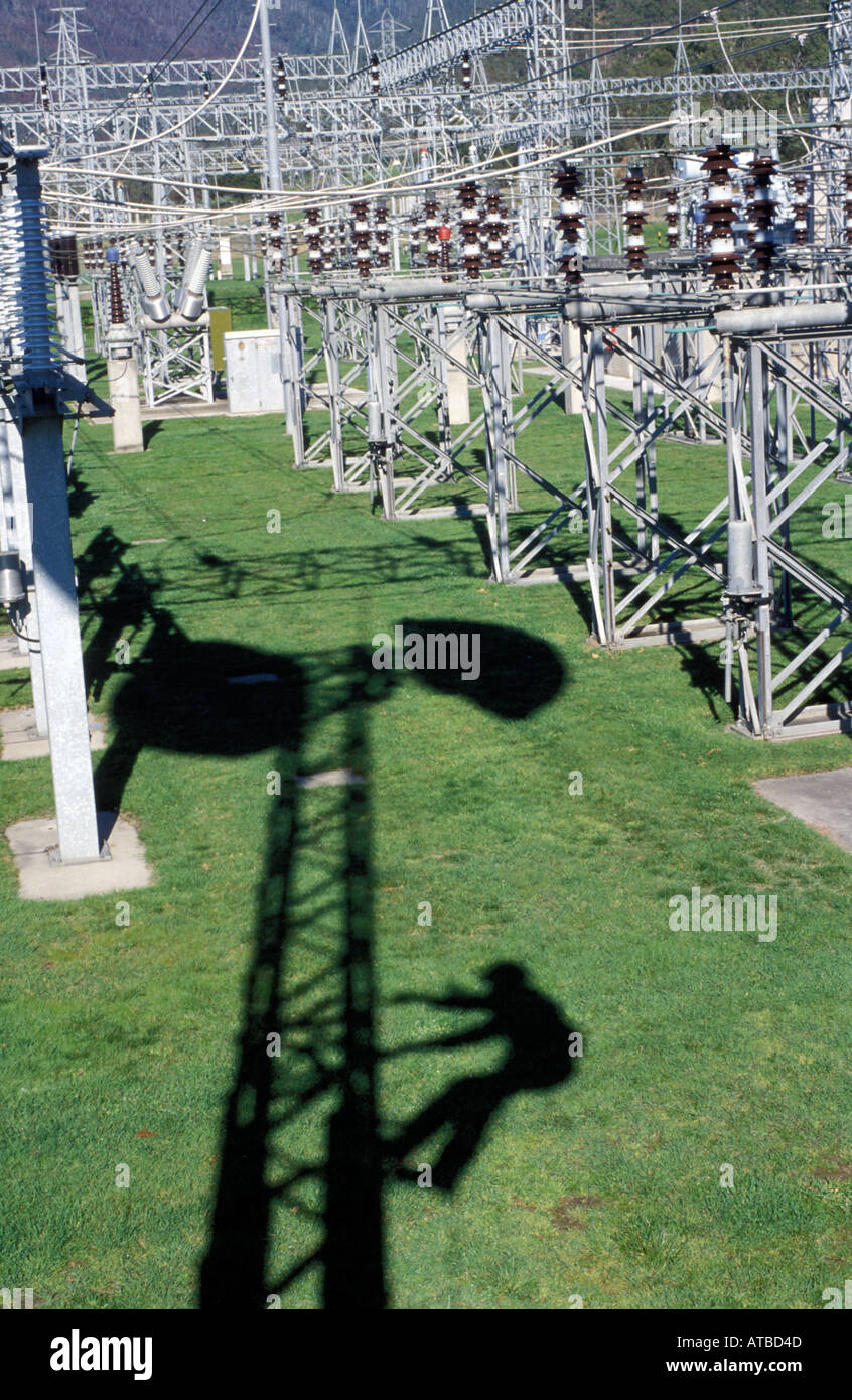 electricity worker photo by Bruce Miller generator power wires recources Stock Photo