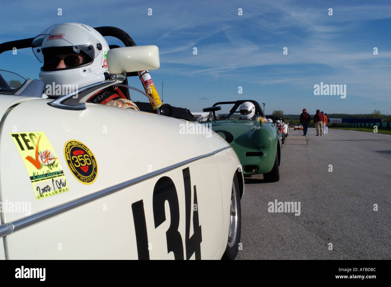 George Balbach sits in his 1961 Porsche 356 roadster on the grid at the ...