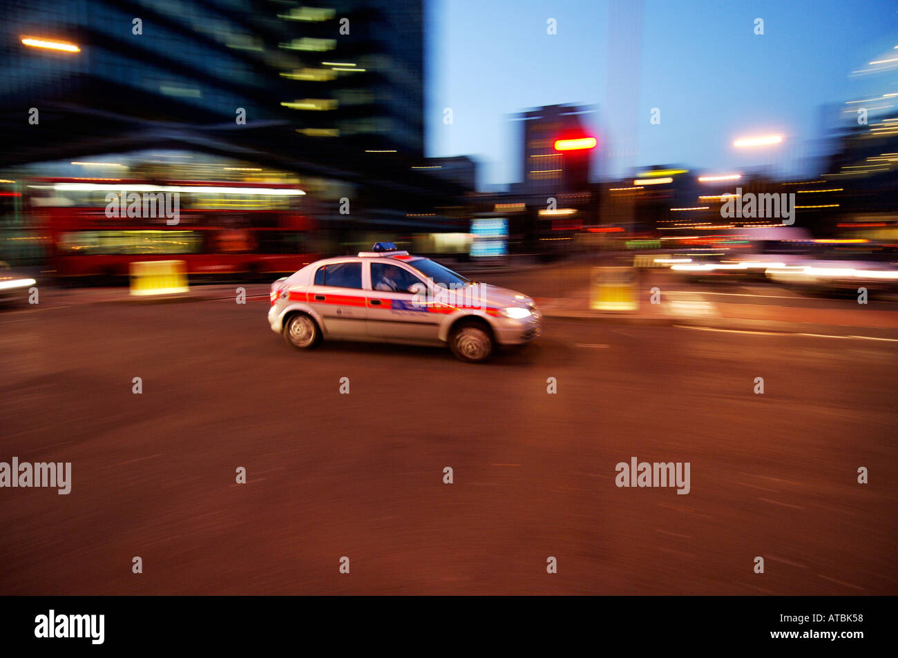 police car at night with motion blur to show movement Stock Photo