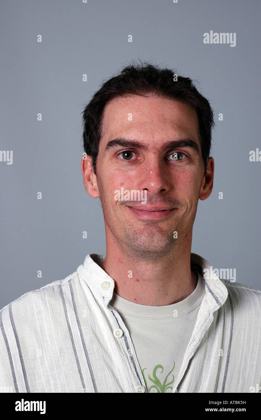 Young man slightly scruffy casually dressed Stock Photo
