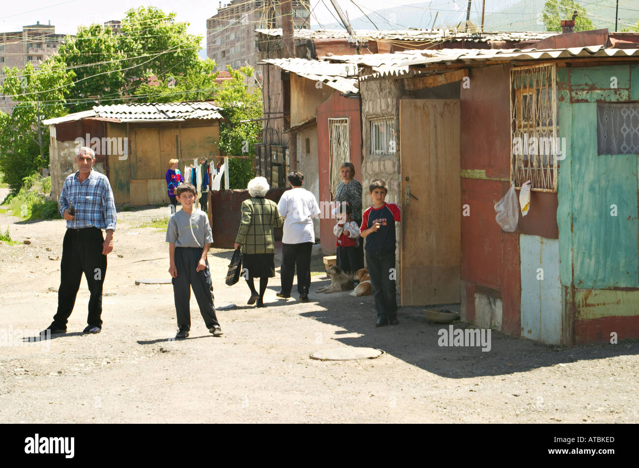 ARMENIA Vanadzor People outside houses made from shipping containers of