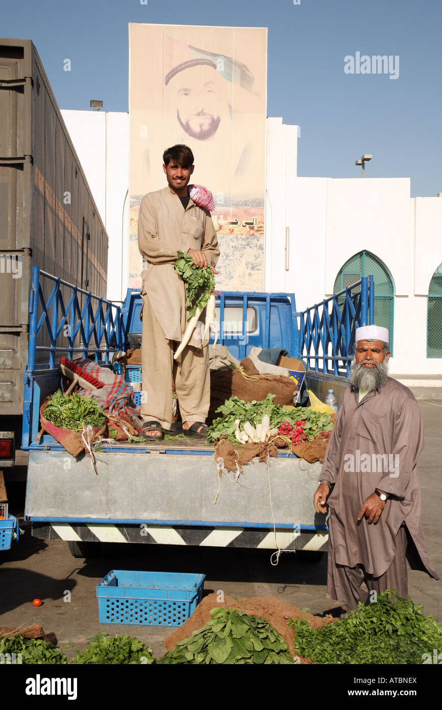 Workers unload vegetables at the Fruit and vegetables market, Abu Dhabi