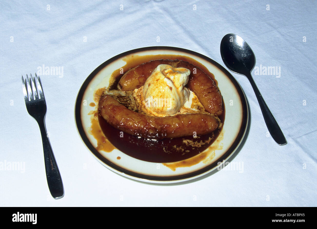 A plate of traditional banana flambe a local speciality arranged on the