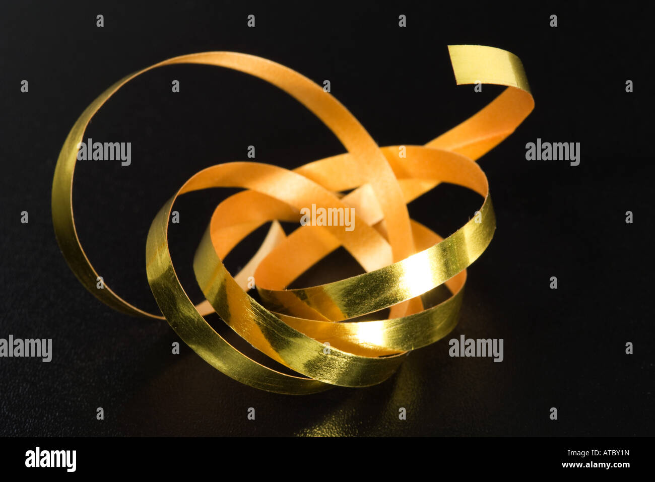 Gold giftwrap ribbon Stock Photo Alamy