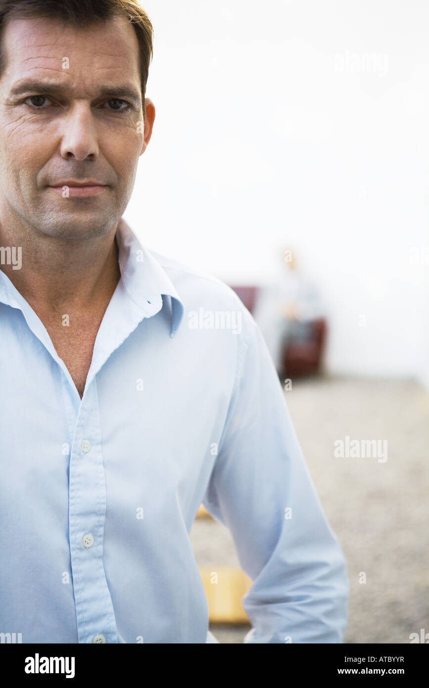 Businessman looking at camera, portrait Stock Photo