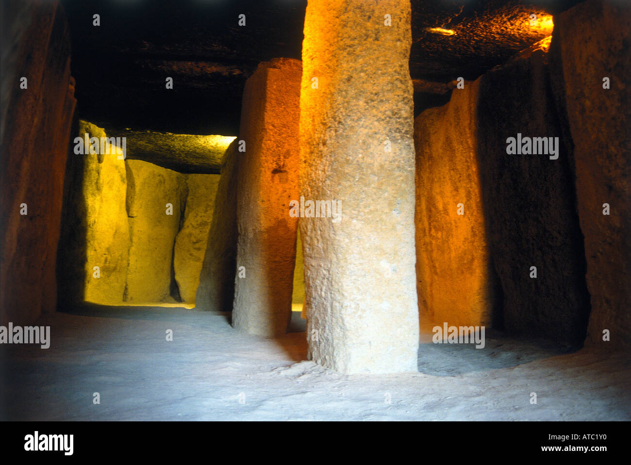 The interior of the Cuevas de Menga Neolithic monuments which comprise dolmens which are covered chambers lined with huge flat stones with monoliths supporting the roof like pillars dating from between 4500 BC and 2500 BC Stock Photo