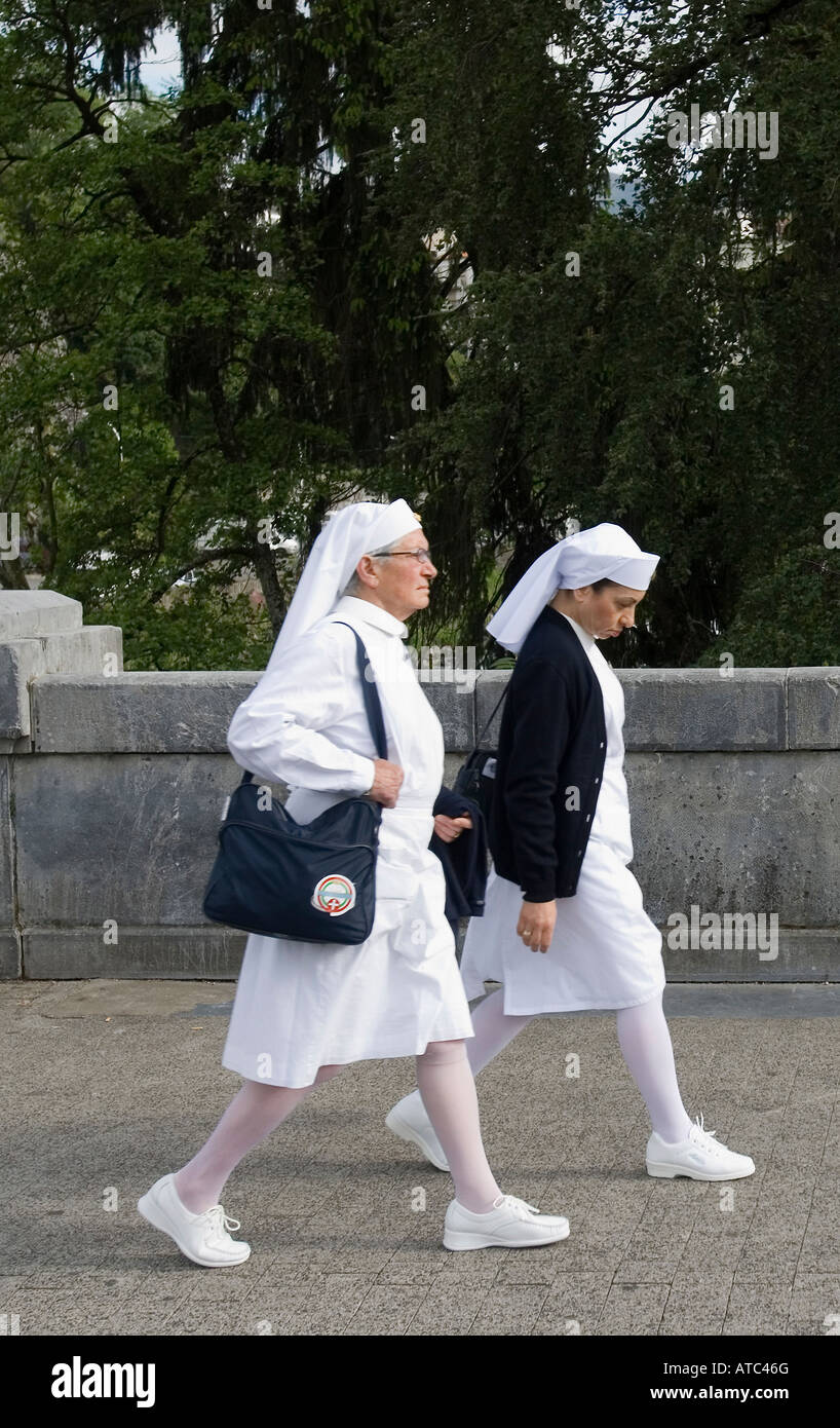 Nuns taking a walk, Lourdes, France Stock Photo