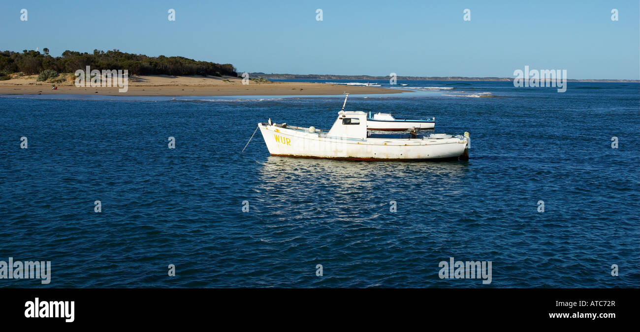 A boat anchored at Barwon heads Stock Photo Alamy