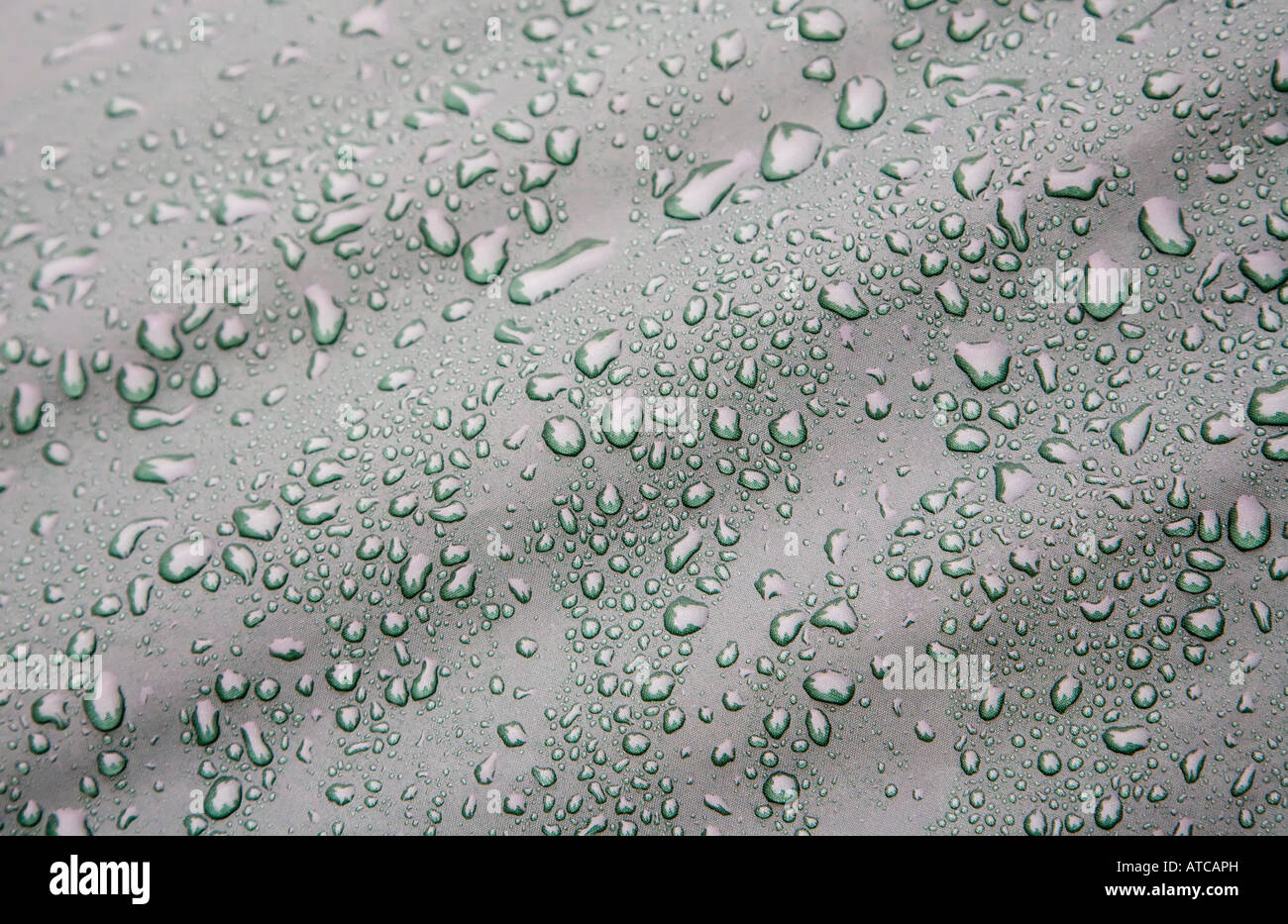 Raindrops on waterproof flysheet of tent Stock Photo