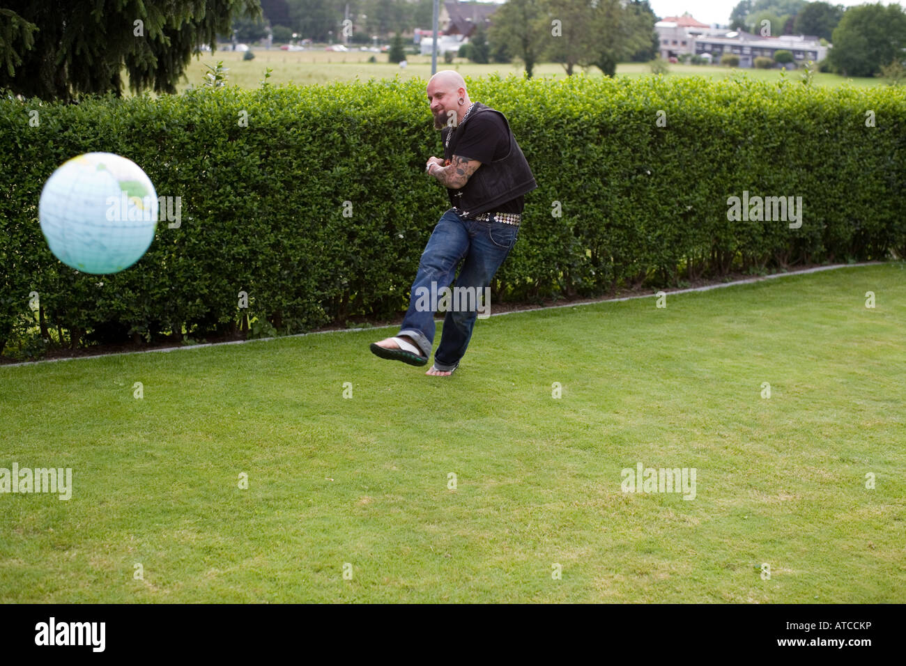 Man throws a ball Stock Photo Alamy