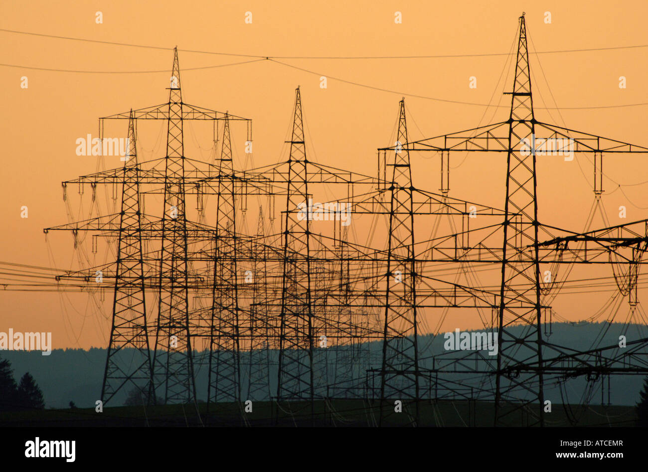 High voltage transmission lines at sunset Stock Photo