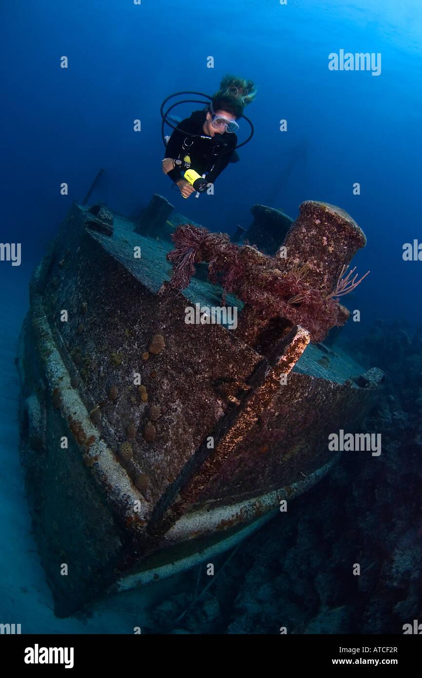 Bermuda wreck diving. Hermes wreck, diver, female diver, underwater, blue water, clear water, scuba, diving, Stock Photo
