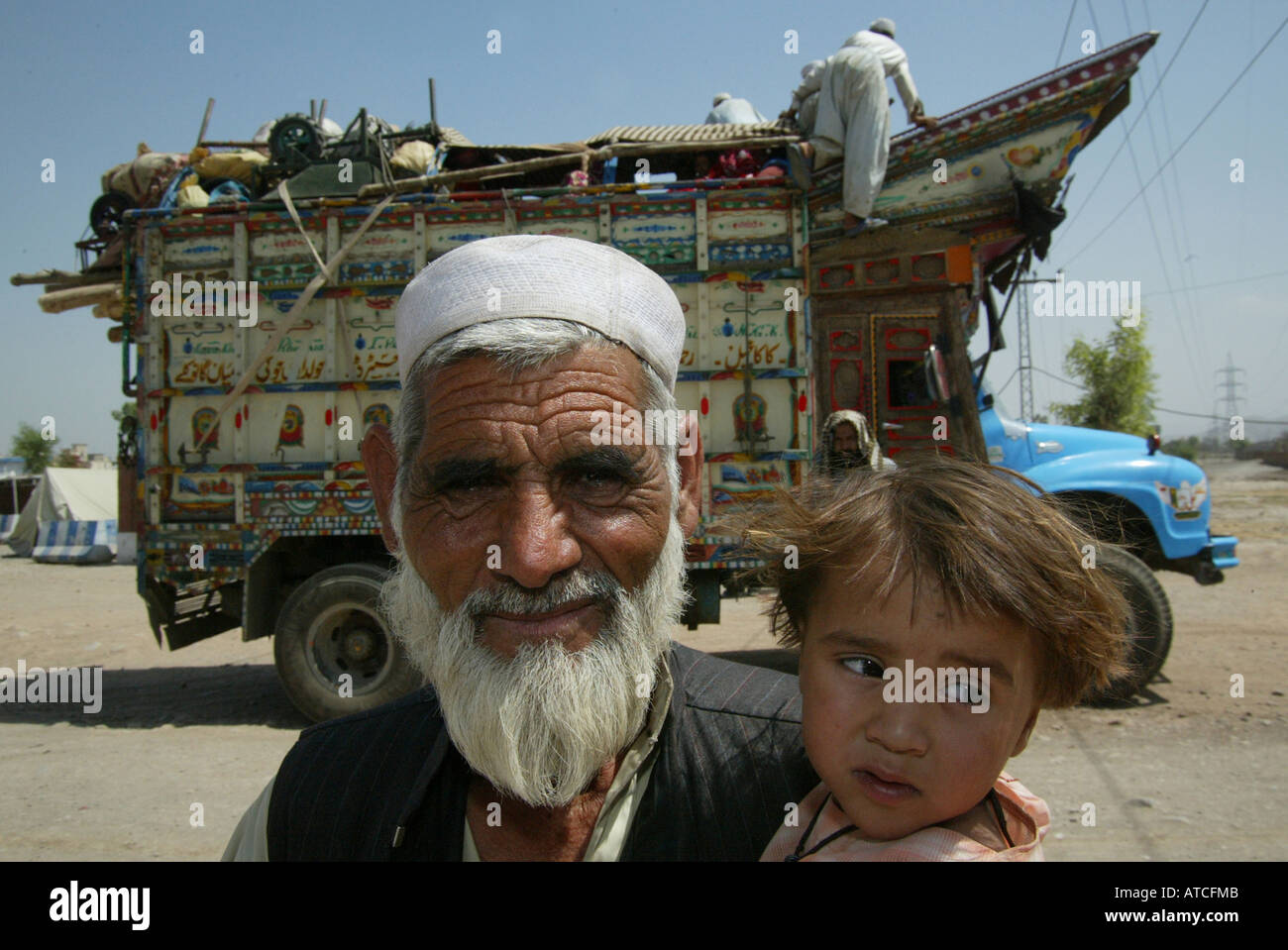 economical afghan refugees who found daily labour in Peshawar Stock Photo
