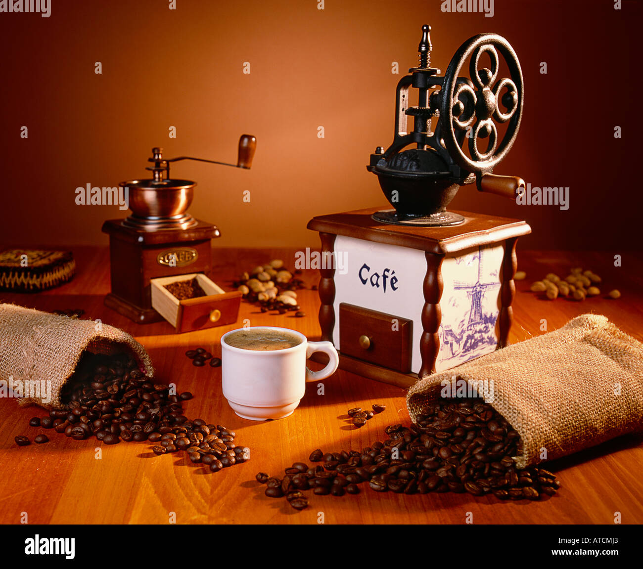 Still life about coffee A cup of black coffee two sacks with coffee