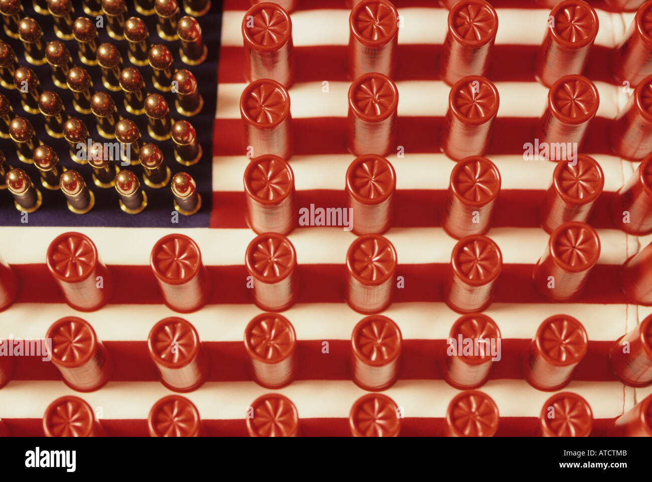 Shotgun shells and rifle bullets on an American flag Stock Photo - Alamy