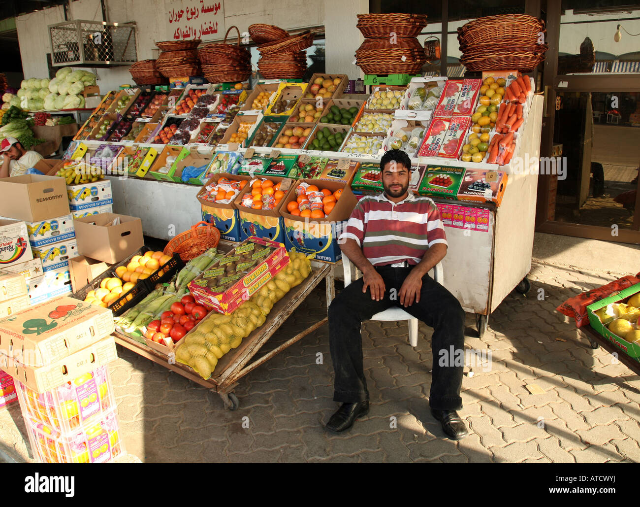 Stall keeper, Fruit and veg market, Abu Dhabi Stock Photo Alamy