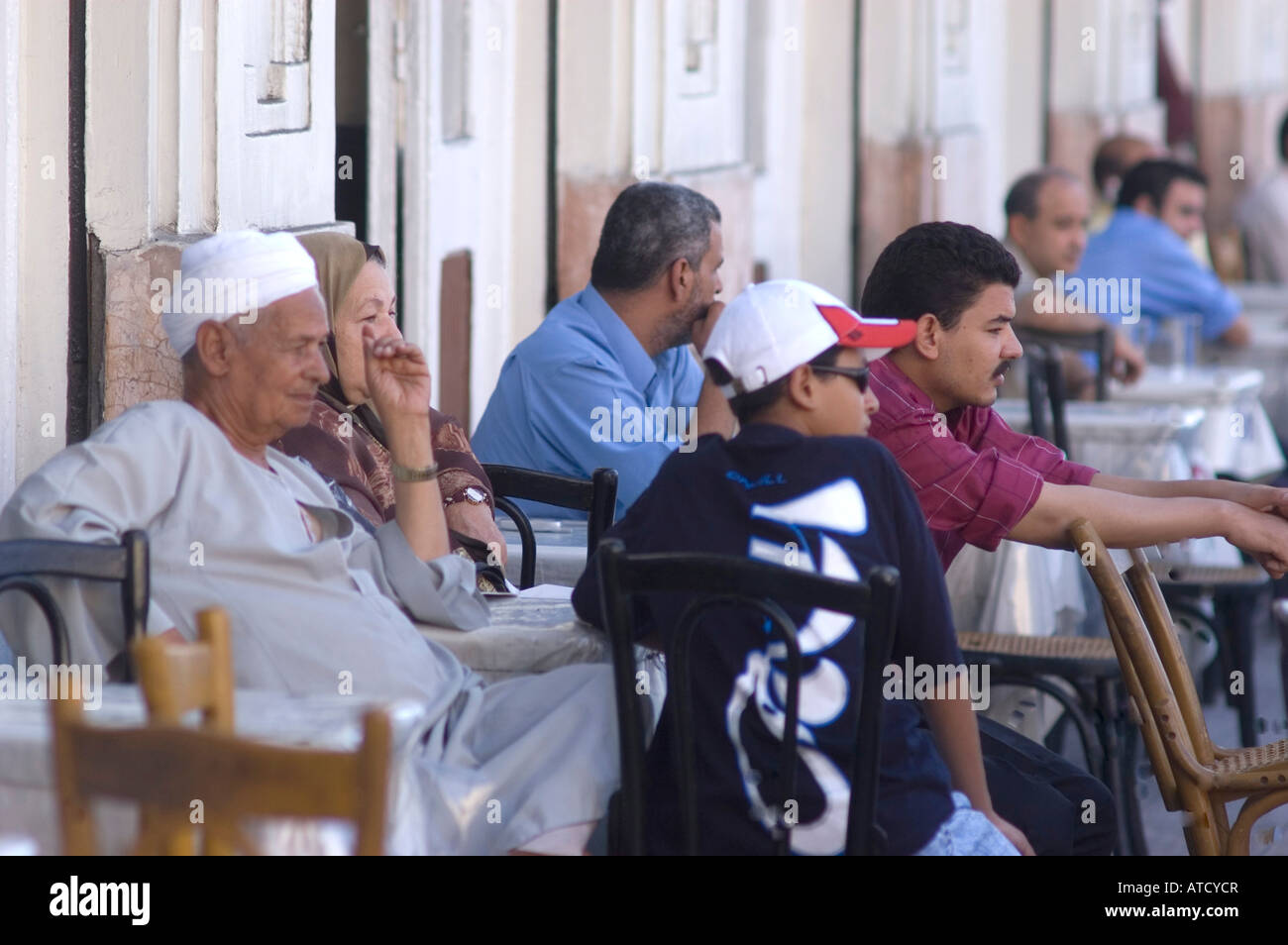 Egyptians sitting at outdoor cafe in Alexandria Egypt Stock Photo Alamy