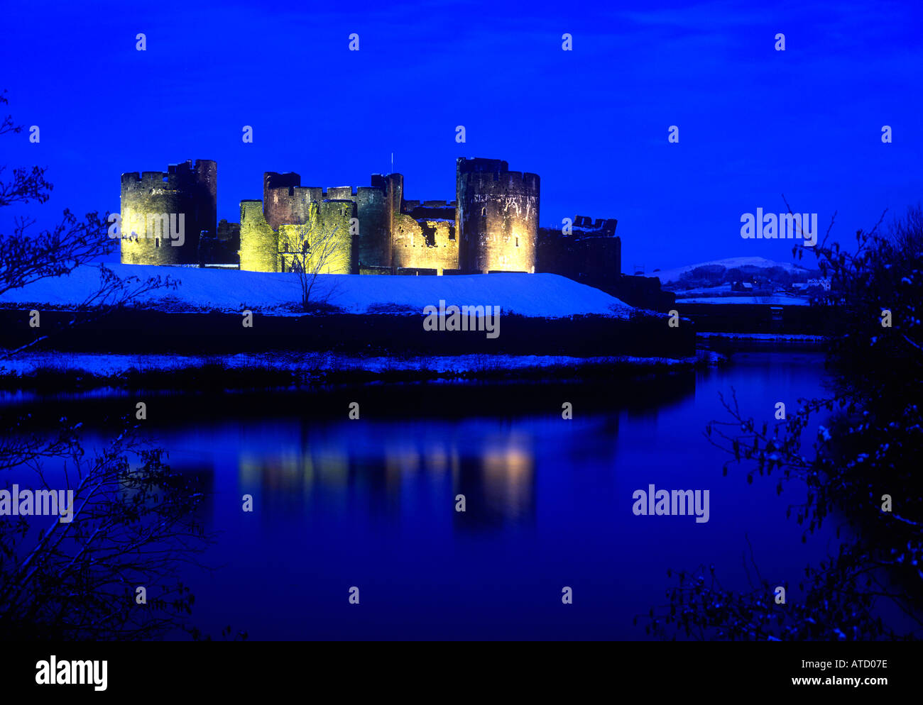 Caerphilly Castle at night Mid Glamorgan Wales UK DA  Stock Photo