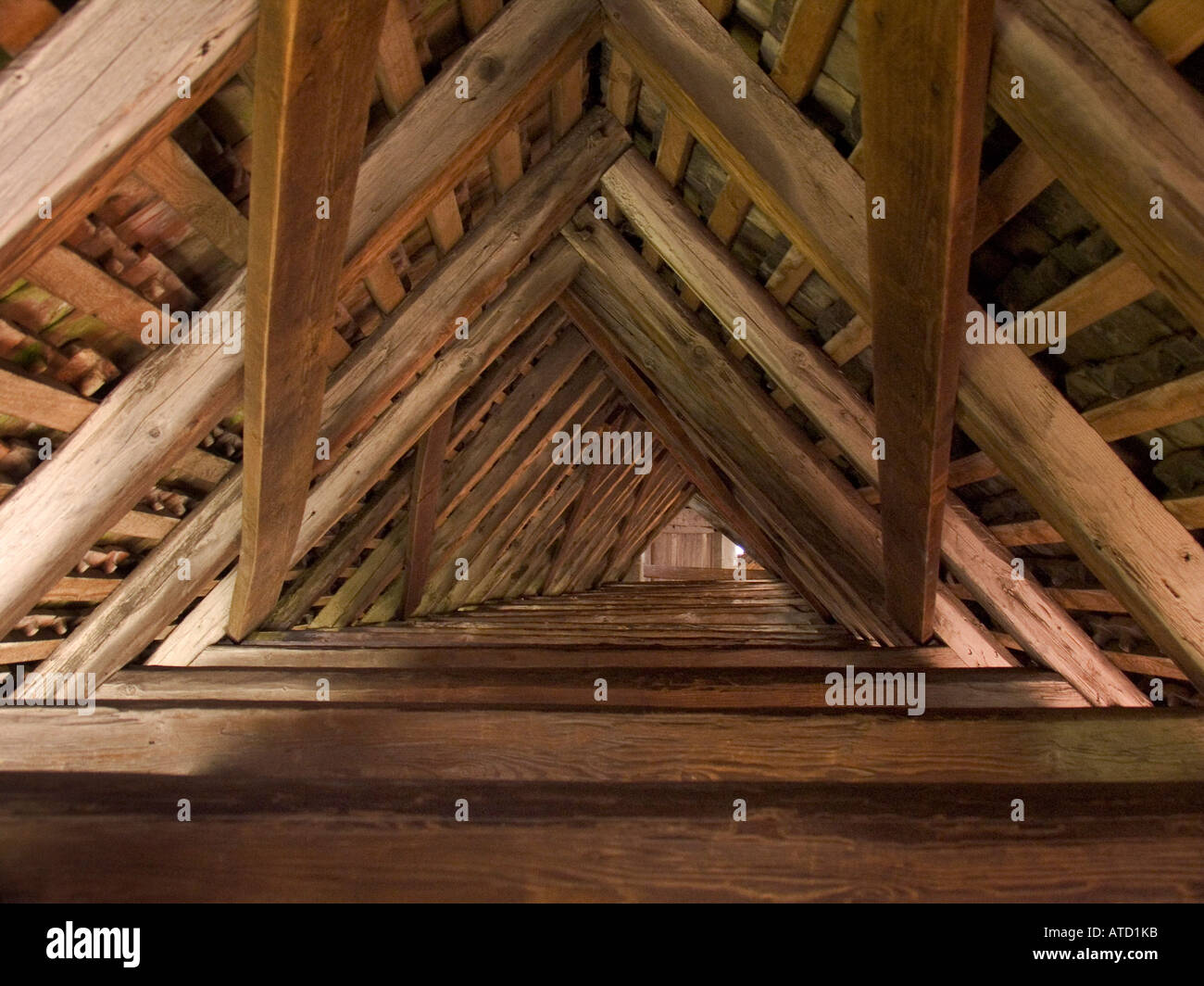 Interior wooden support structure of the roof of fortified wall around the medevial town of Murten Switzerland Stock Photo