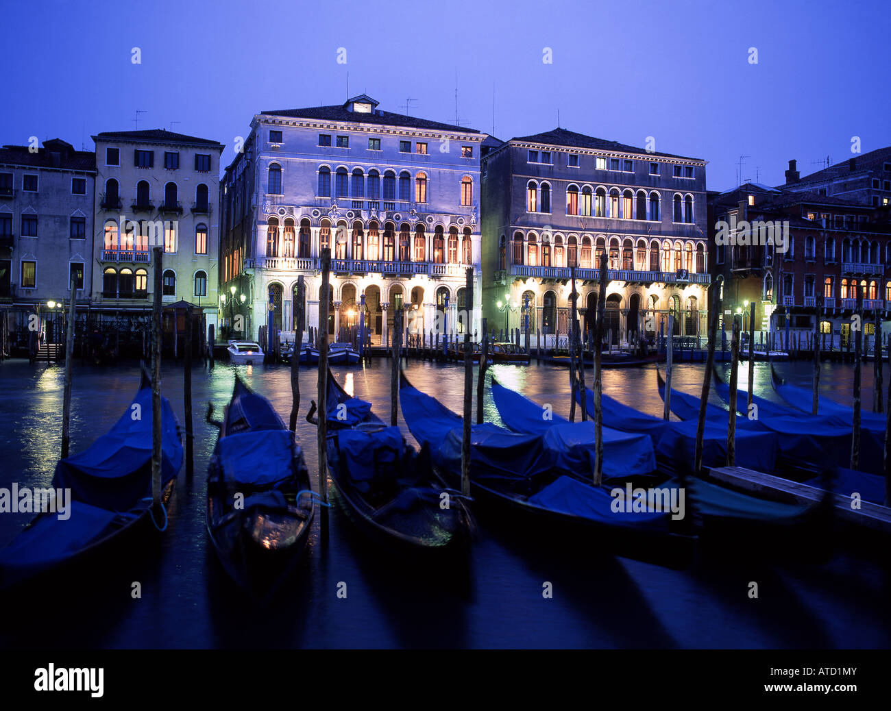 Gondolas and Grand Canal at twilight night San Polo Venice Veneto Italy Stock Photo
