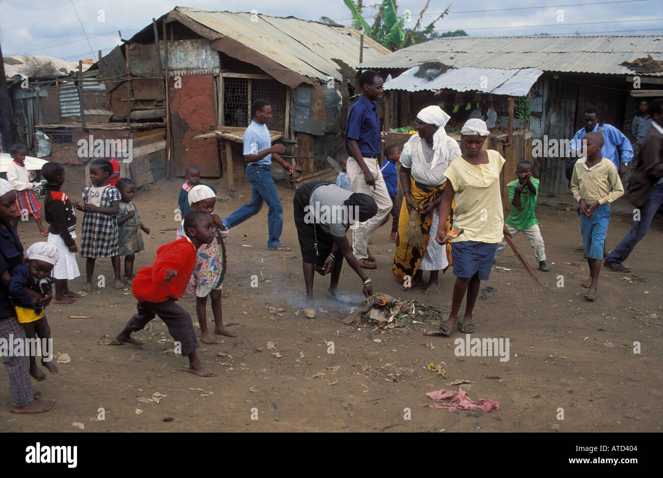 People cleaning their slum area Korogocho Nairobi Kenya Stock Photo