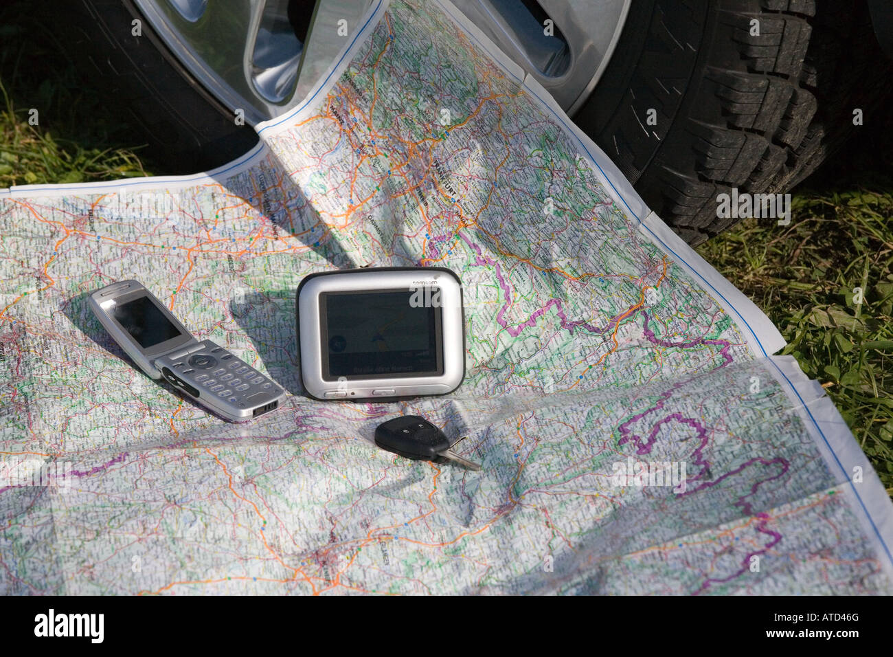 Navigation with map and navigation equipment Stock Photo Alamy