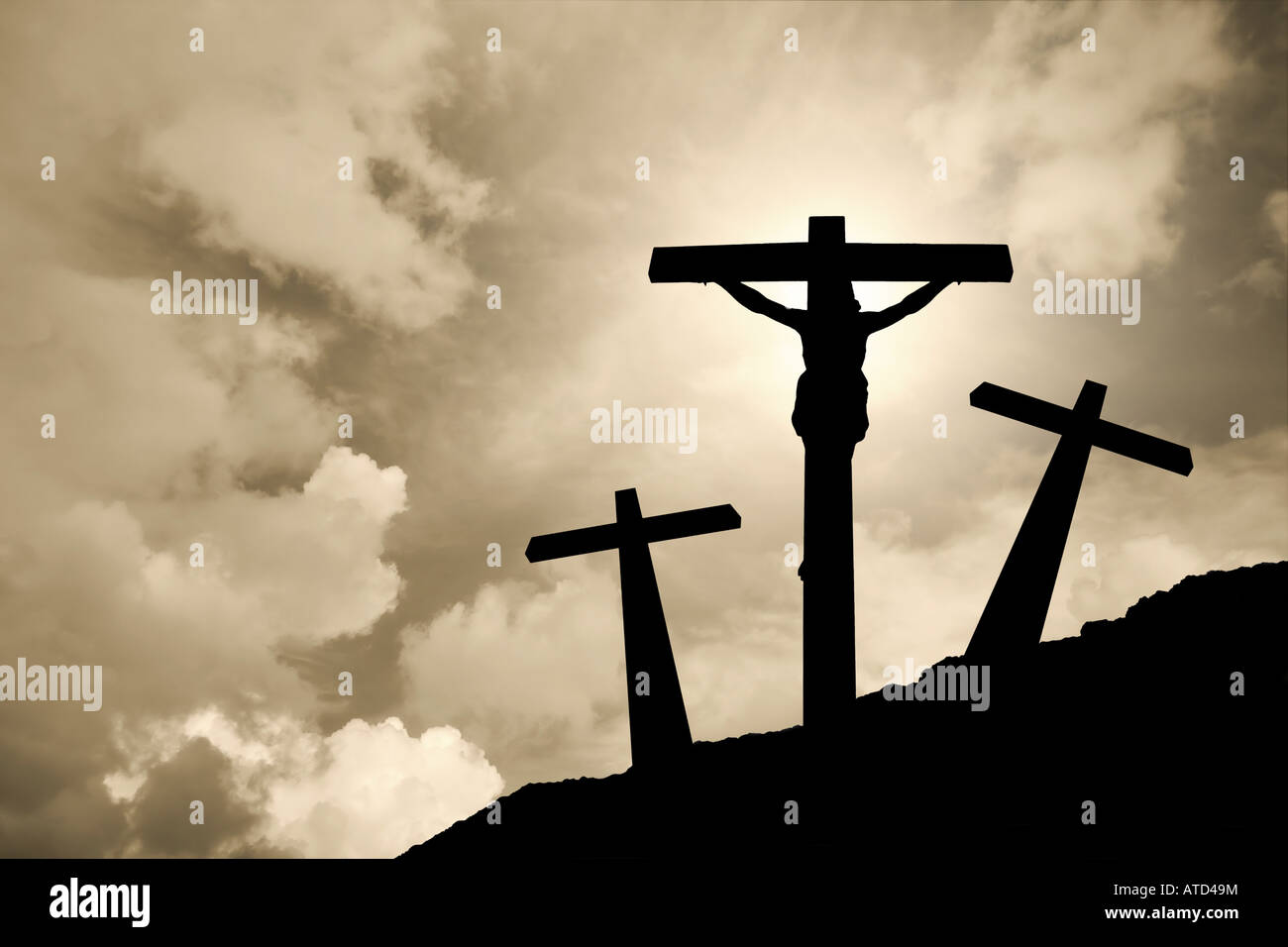Jesus Christ crucified in Golgotha /// crucifixion Easter crucifix Calvary passion backlit silhouette cross religion god Christianity clouds storm sky Stock Photo