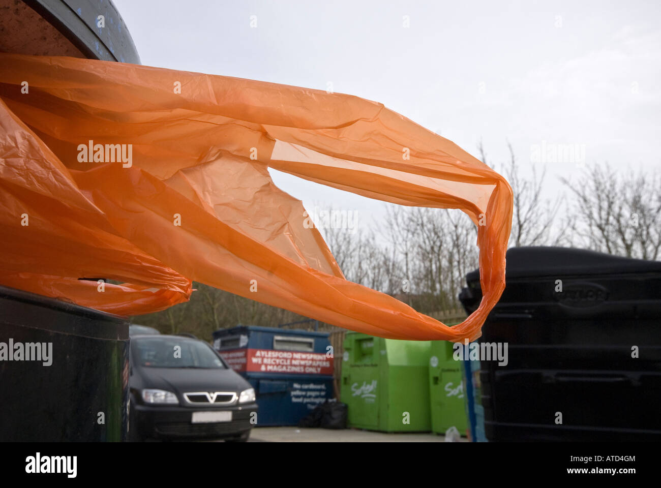 Orange plastic bag rubbish Stock Photo Alamy