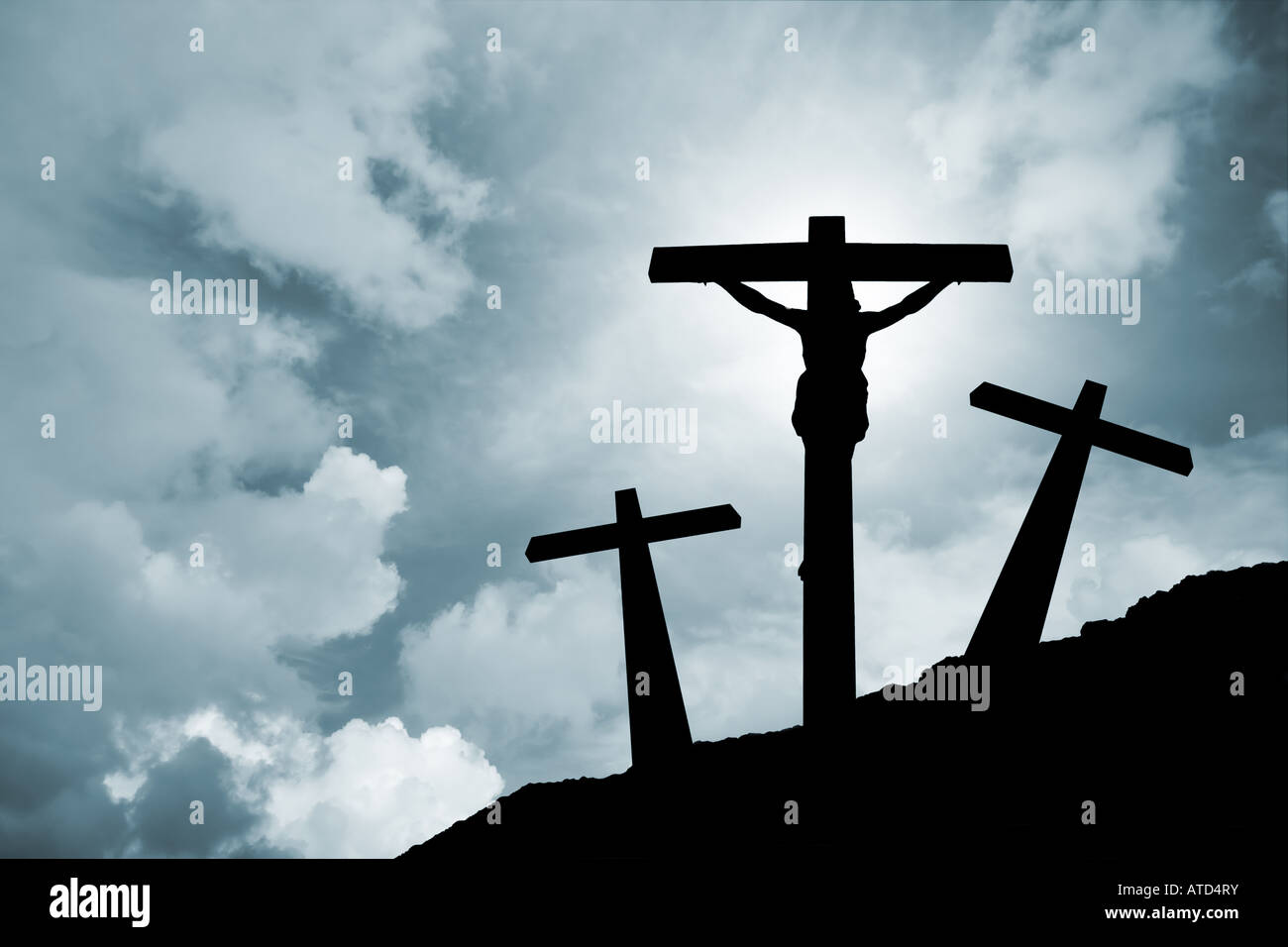 Jesus Christ crucified in Golgotha ///crucifixion Easter crucifix Calvary passion backlit silhouette cross religion god Christianity clouds storm sky Stock Photo