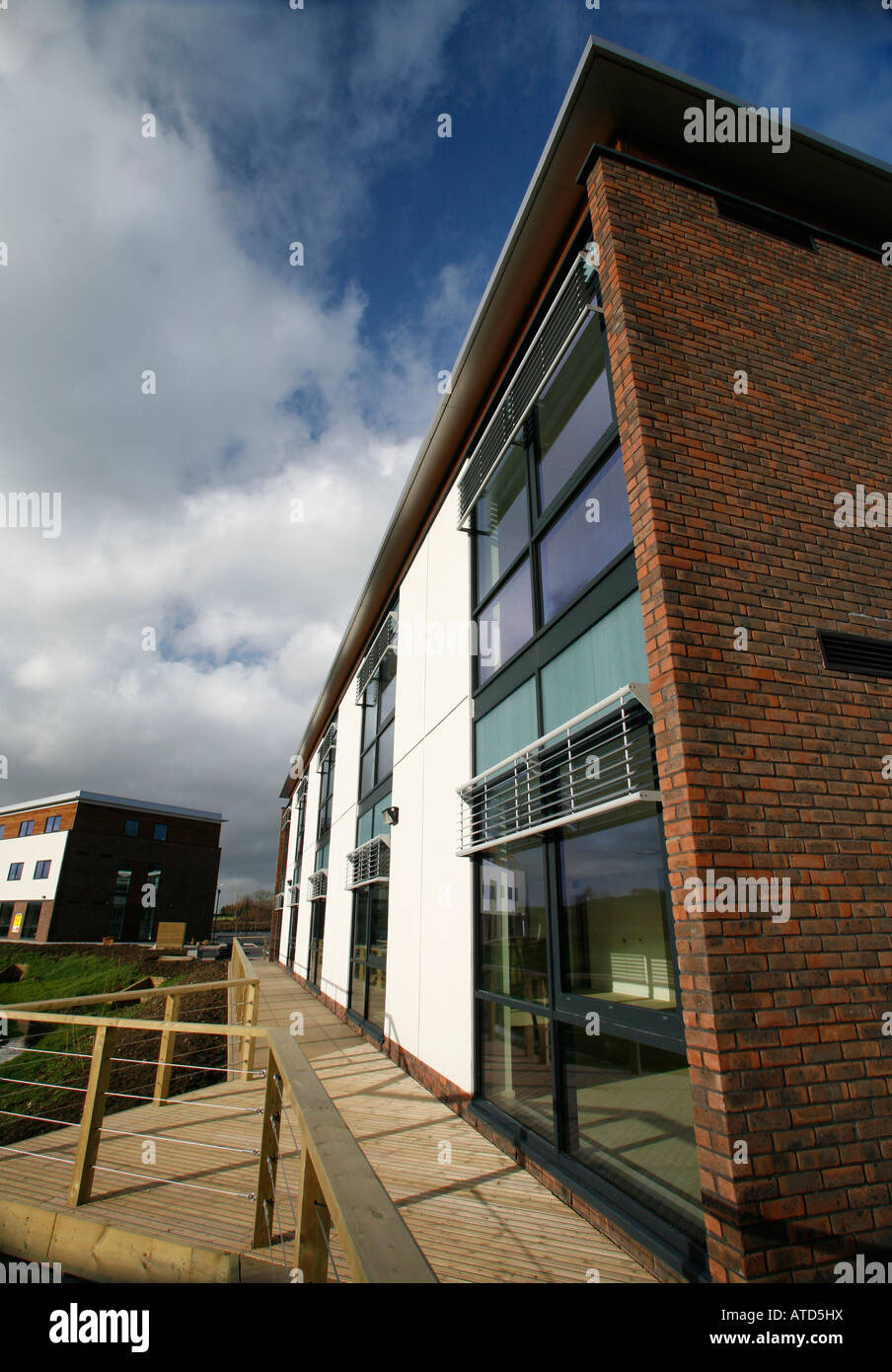 Exterior shot of an exterior of 2 storey office buildings in a modern business park. Stock Photo
