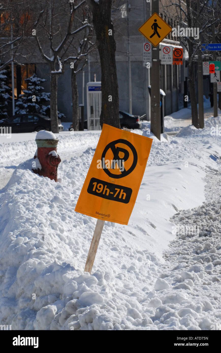 No Parking sign on the streets of Montreal the day the city cleans the snow Stock Photo
