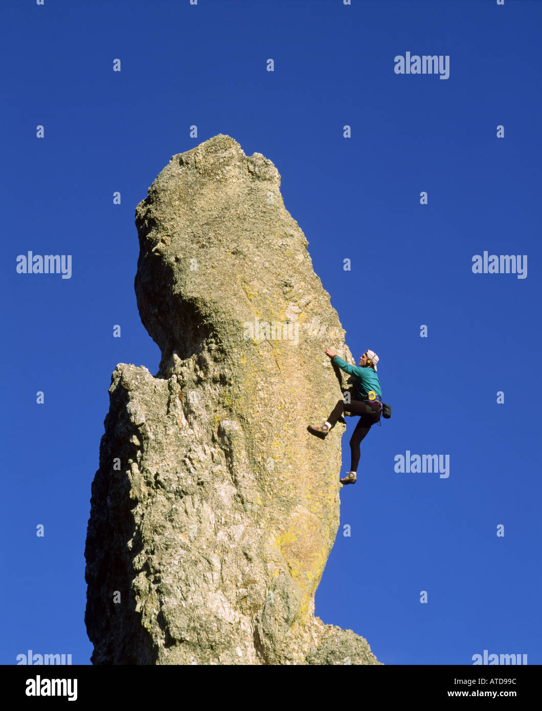 Rock climber reaches the peak at Custer State Park South Dakota Stock Photo