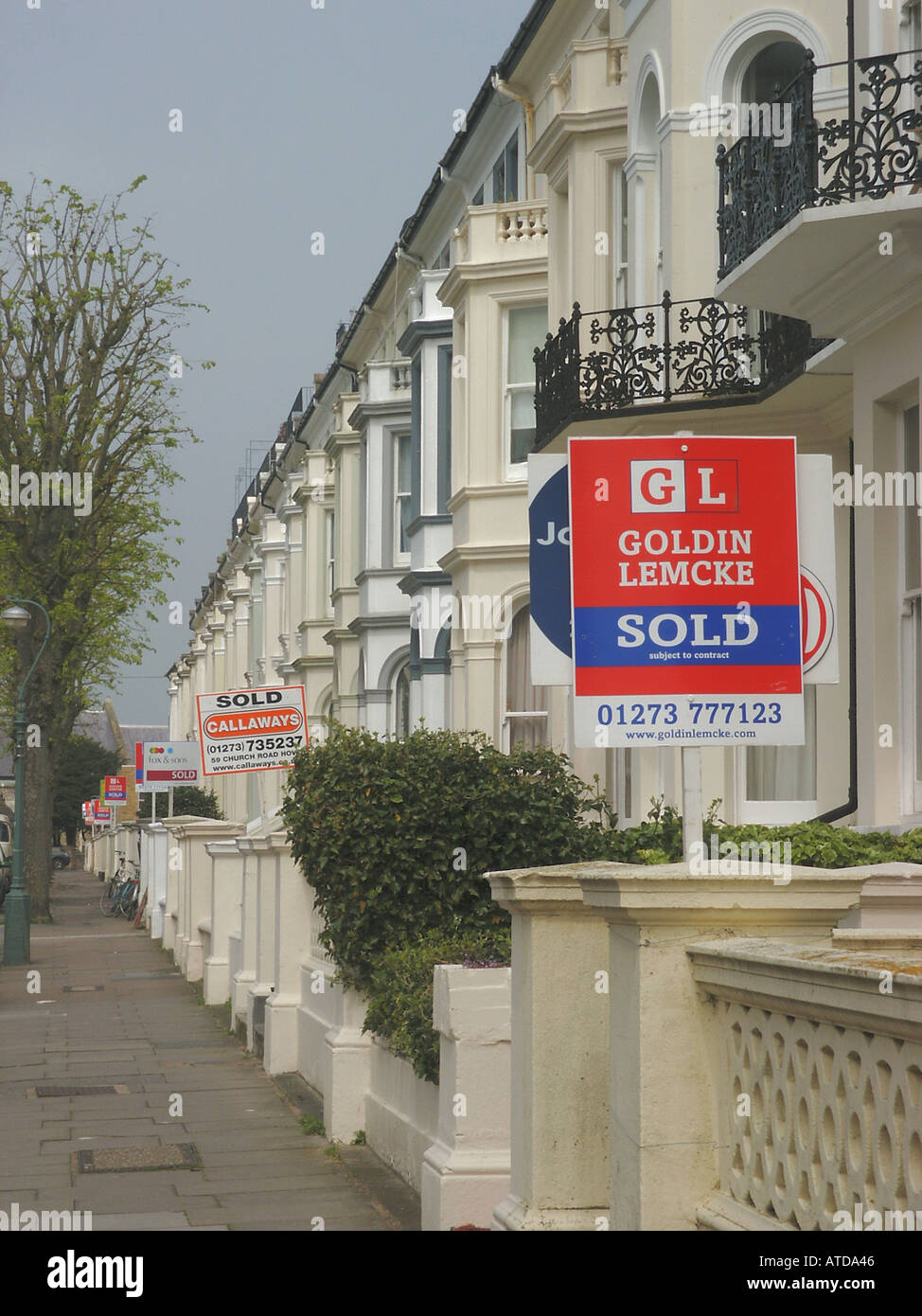 Street of Residential Properties with For Sale and Sold Signs Hove East Sussex England Stock Photo
