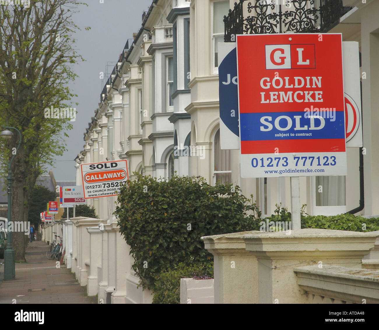 Street of Residential Properties with For Sale and Sold Signs Hove East Sussex England  Stock Photo
