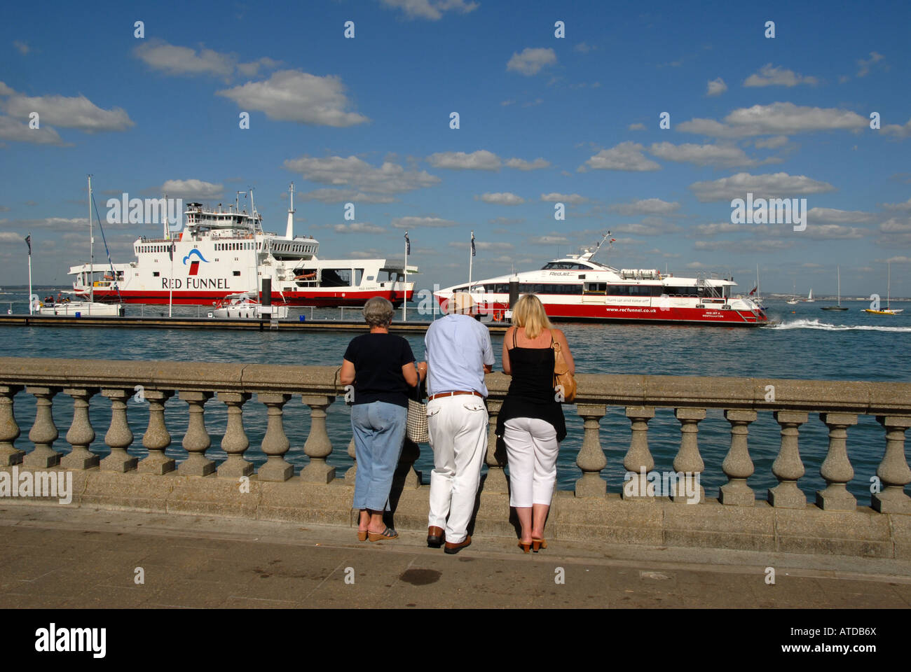 A fleet of ‘Red Funnel ferries' car/passenger ferries arriving and