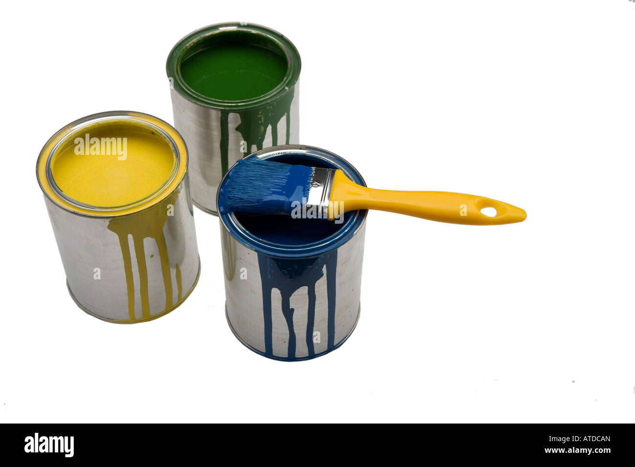 yellow, green and blue color in cans with brush Stock Photo Alamy