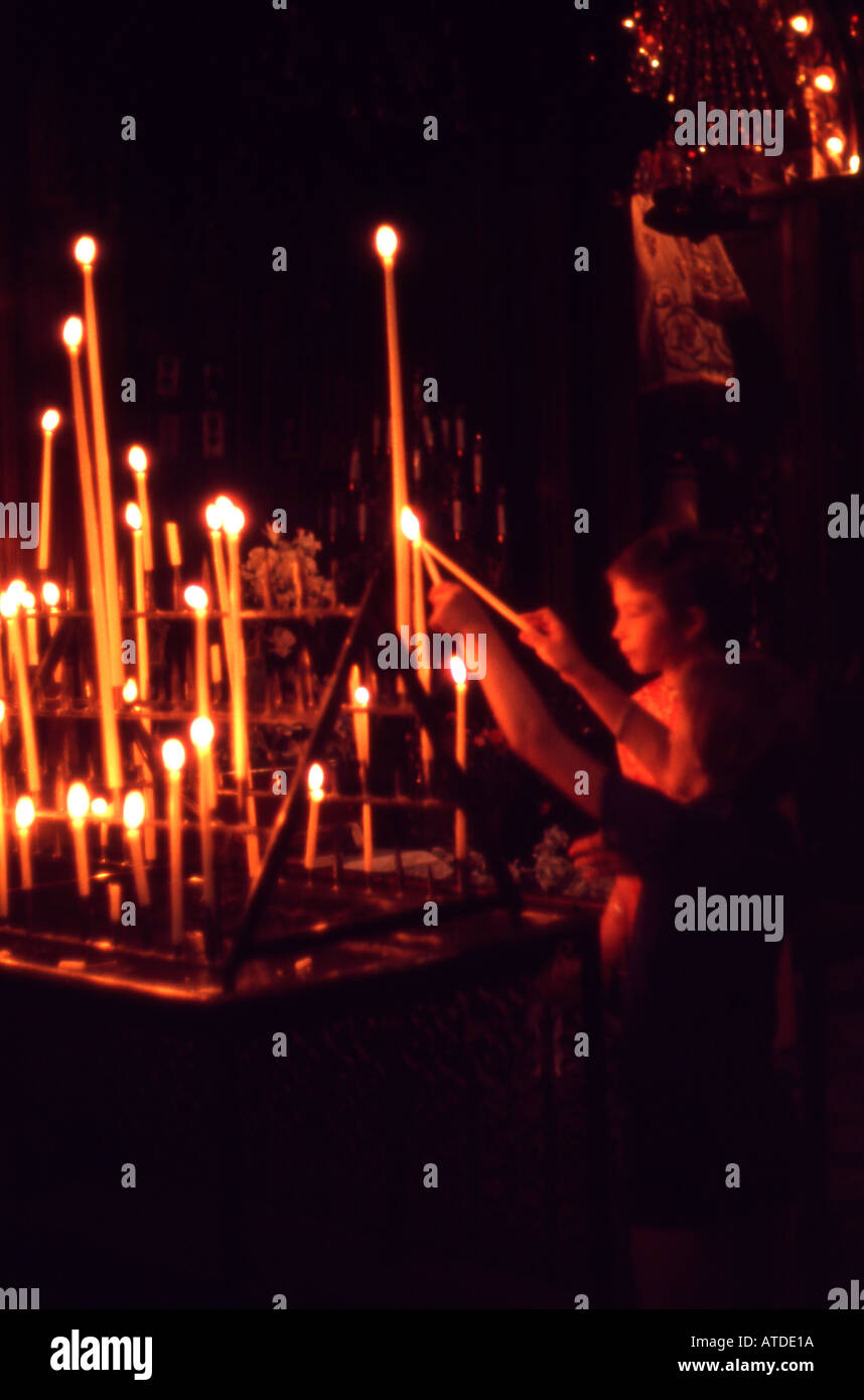 Lighting candles at Walsingham Norfolk England Stock Photo Alamy