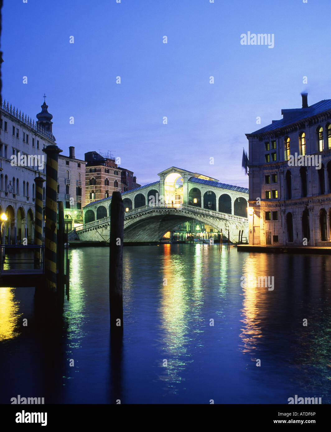 Rialto Bridge and Grand Canal at twilight / night Venice Veneto Italy Stock Photo