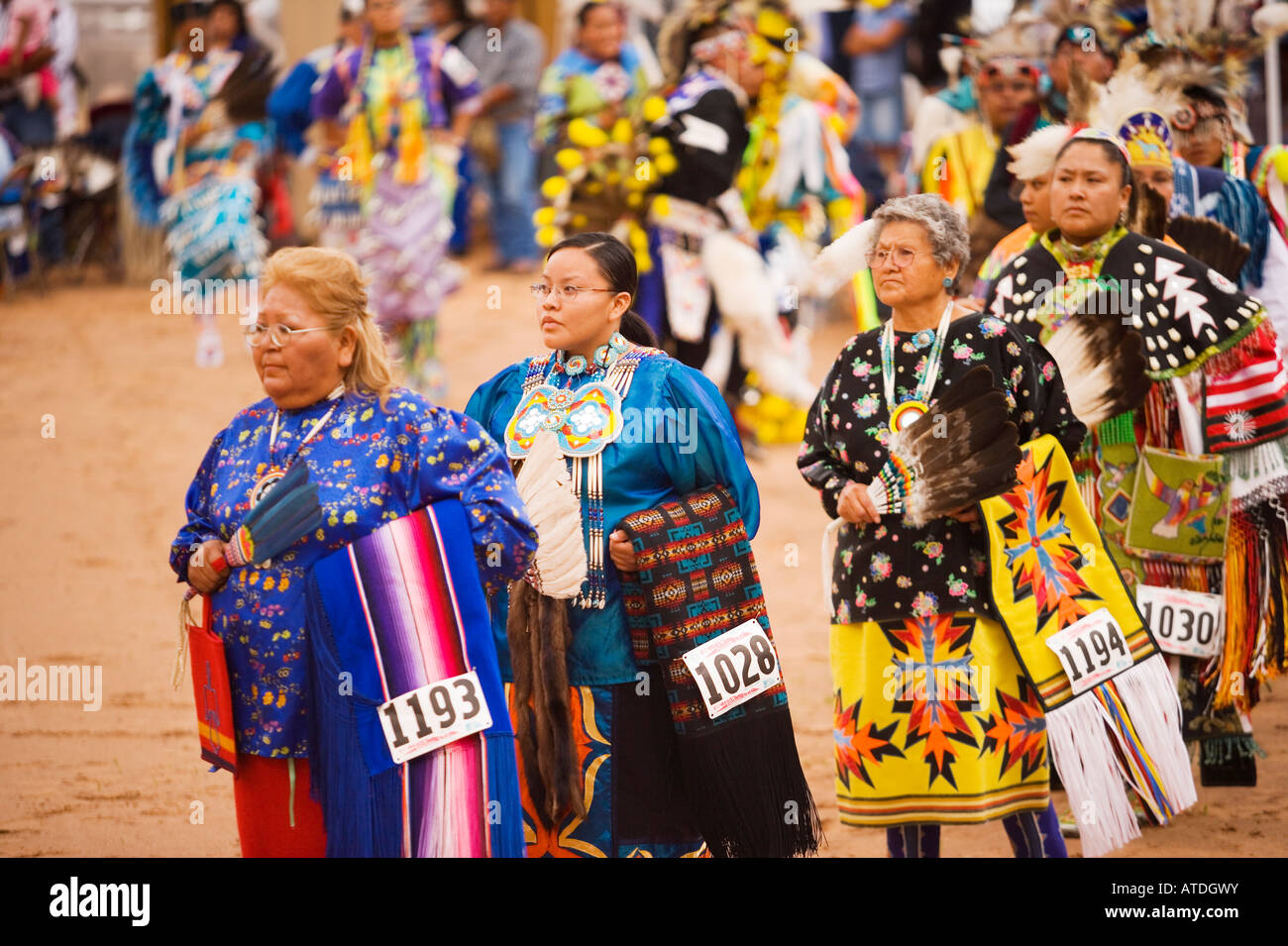 womens traditional dancers in Grand Entrance of powwow Gallup Inter