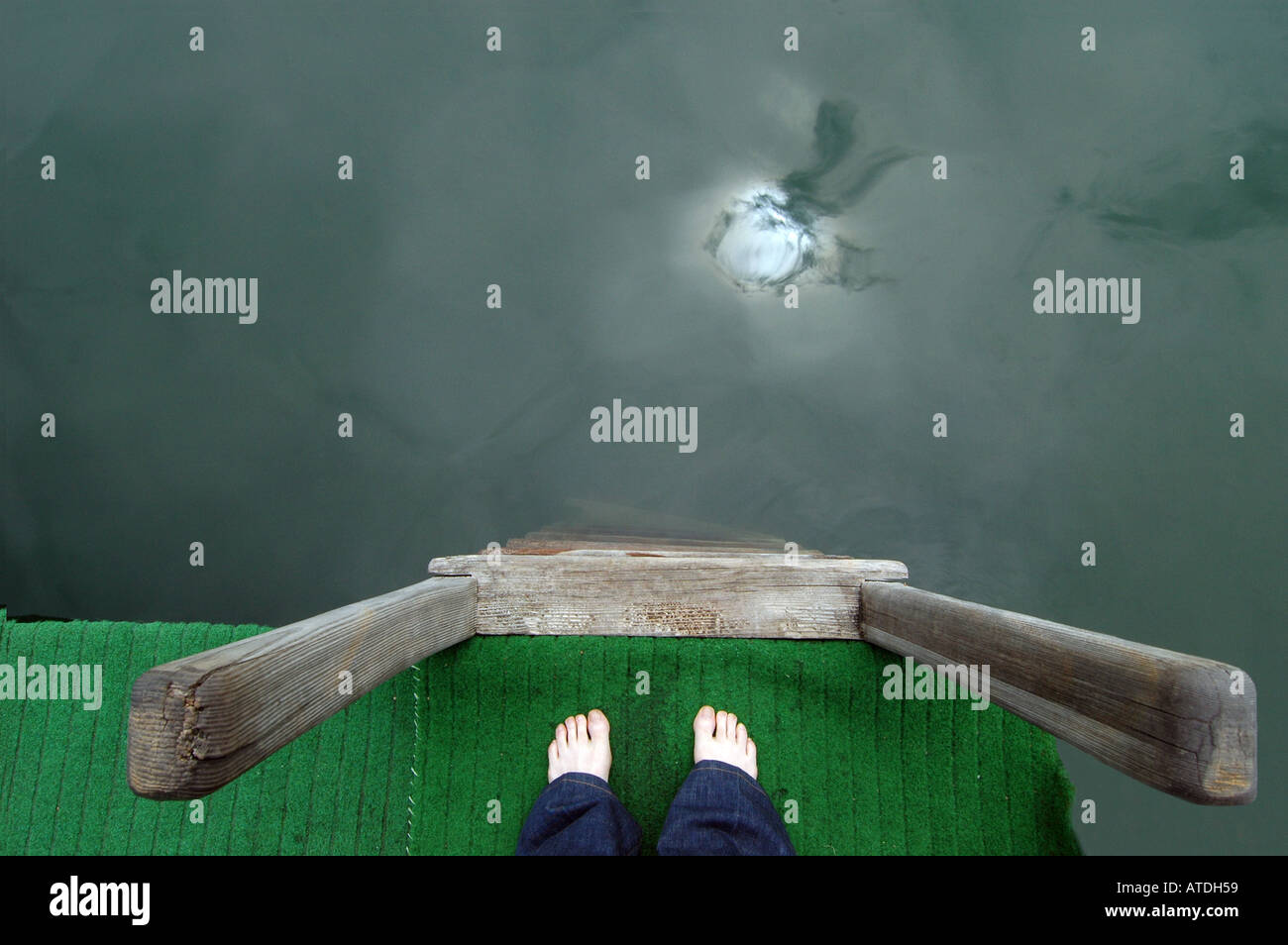 Barefoot on planks at Lake Stock Photo