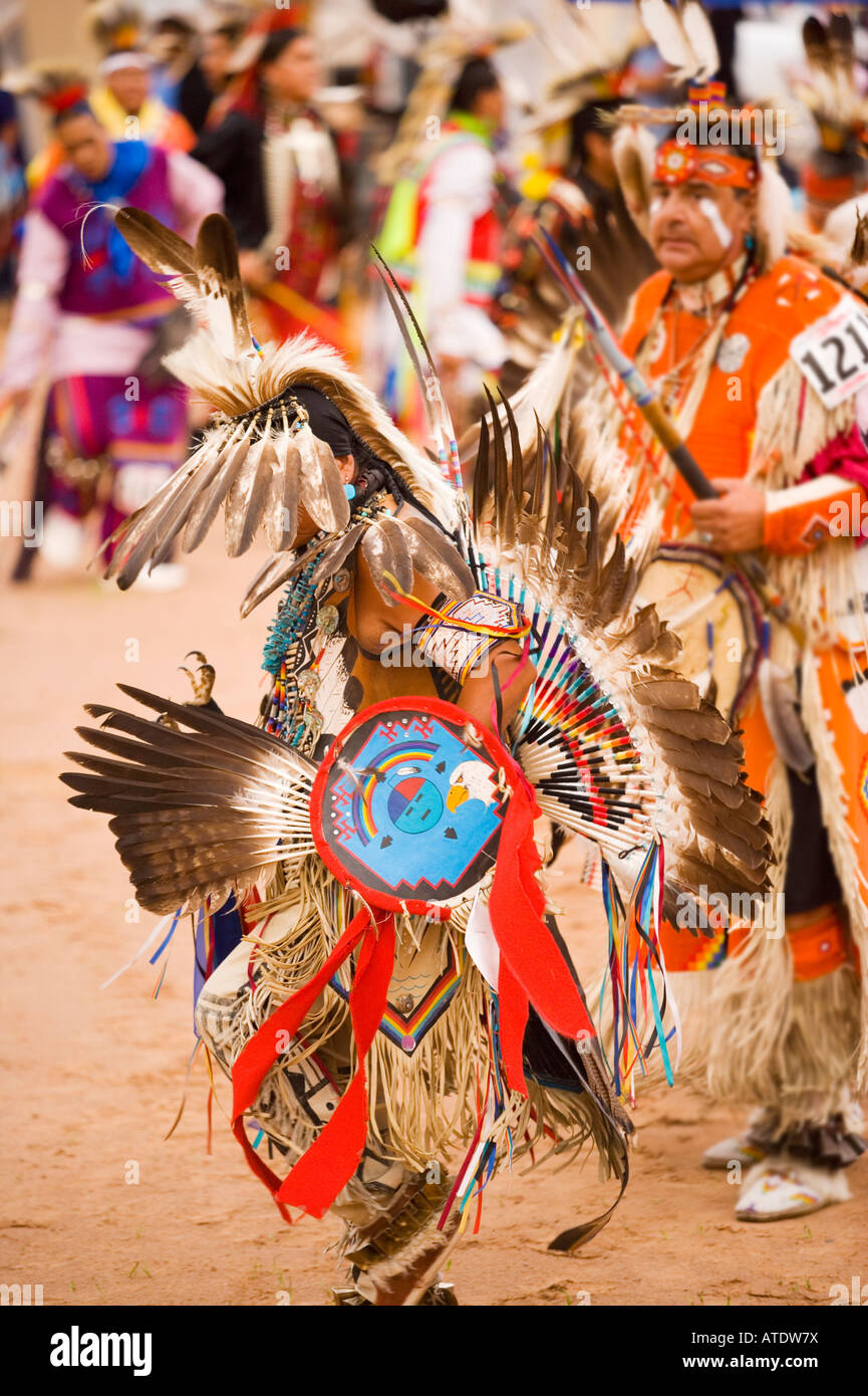 mens traditional dancers in Grand Entrance of powwow Gallup Inter
