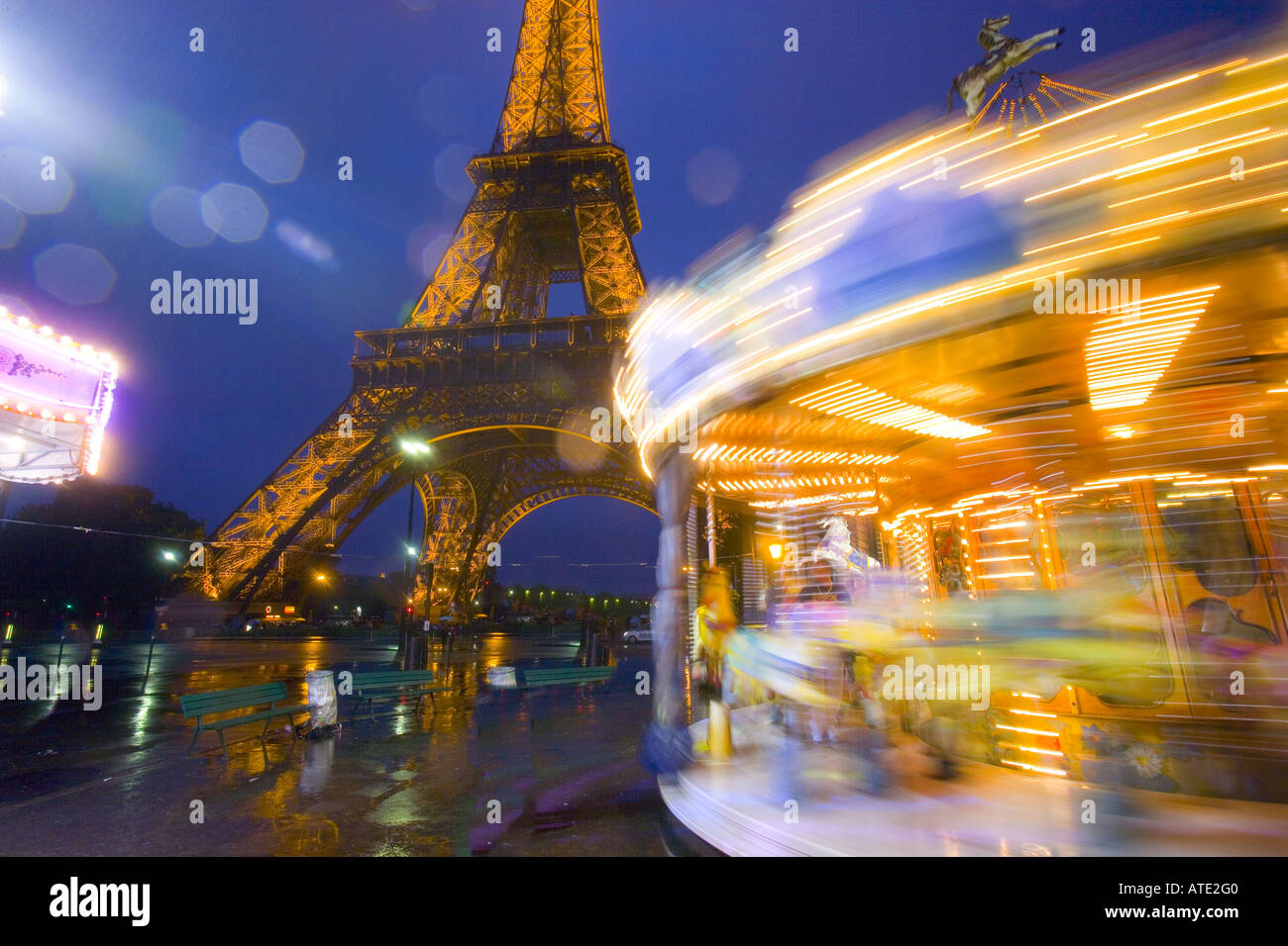Eiffel Tower at twilight with a merry-go-round, Paris, France Stock Photo