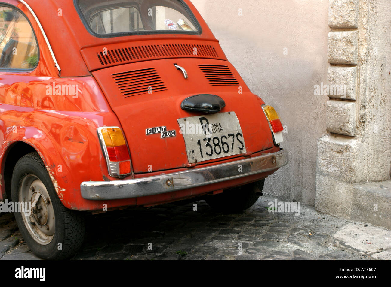 Red Fiat 500 parked in a street in Rome Italy Stock Photo - Alamy