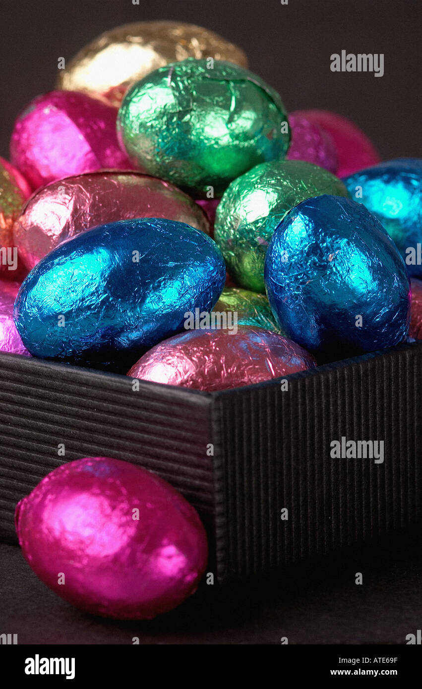 foil covered chocolate eggs in a box Stock Photo
